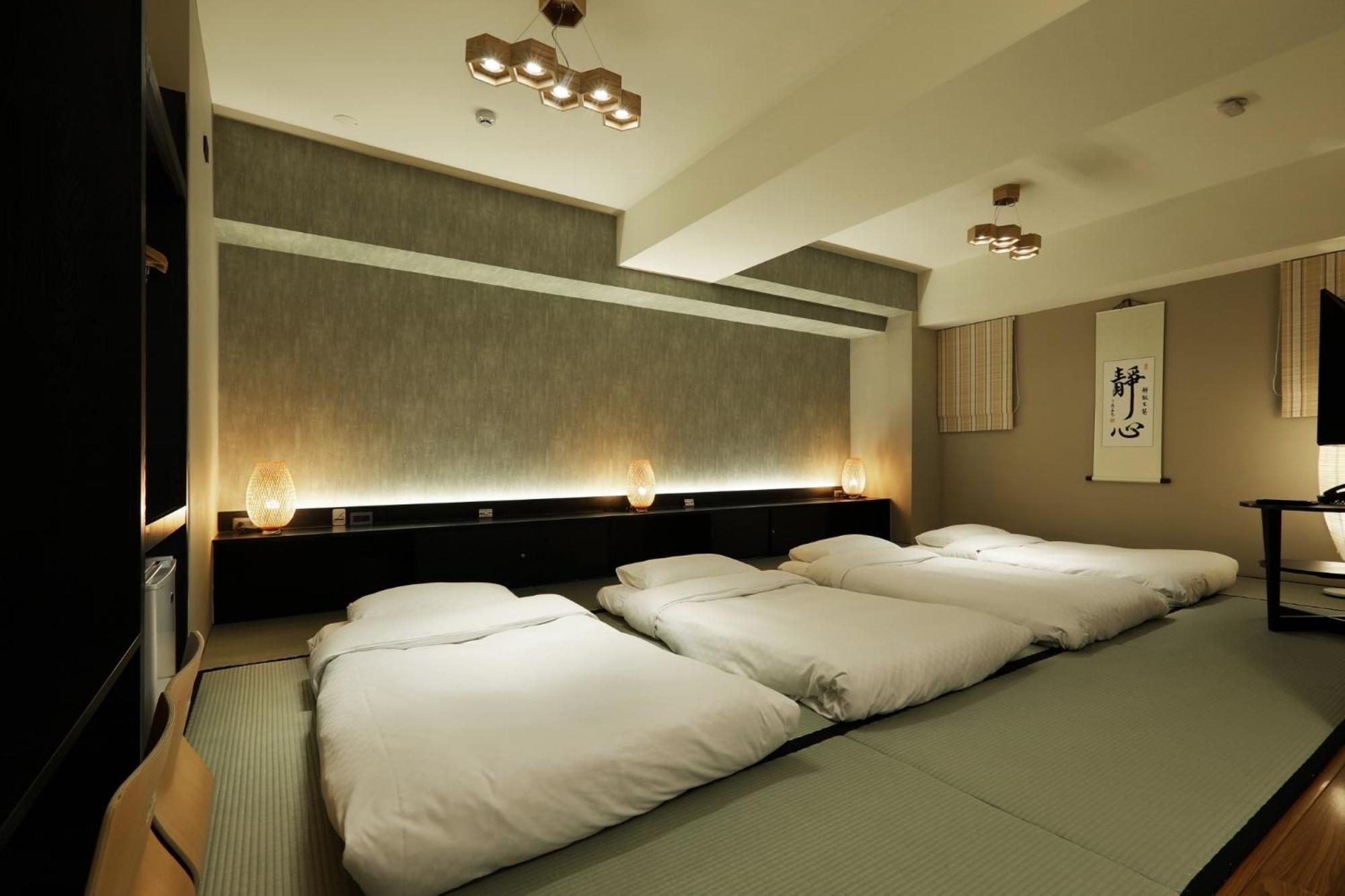 Kun Tour Hotel Тайджун Стая снимка