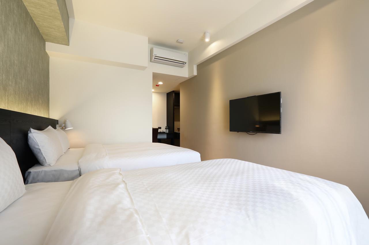 Kun Tour Hotel Тайджун Екстериор снимка