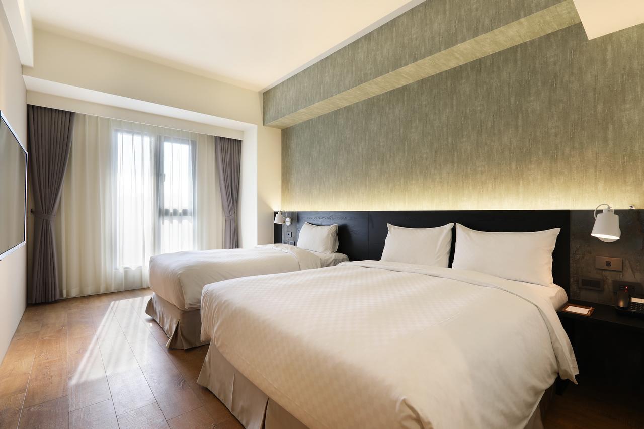 Kun Tour Hotel Тайджун Екстериор снимка