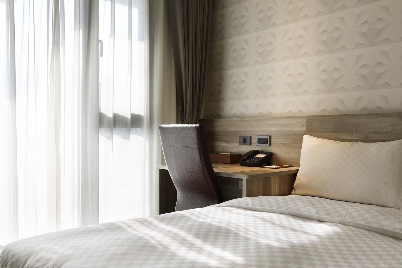 Kun Tour Hotel Тайджун Екстериор снимка
