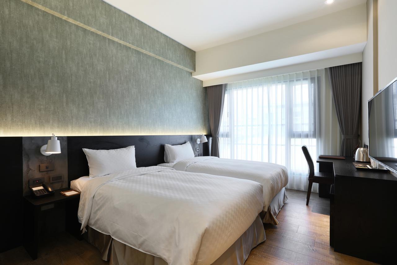 Kun Tour Hotel Тайджун Екстериор снимка