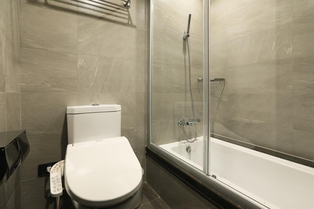 Kun Tour Hotel Тайджун Екстериор снимка