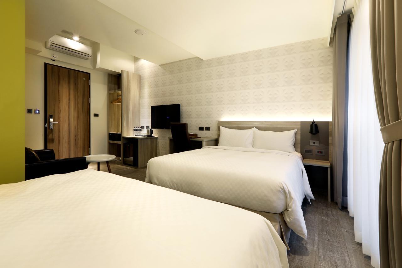 Kun Tour Hotel Тайджун Екстериор снимка