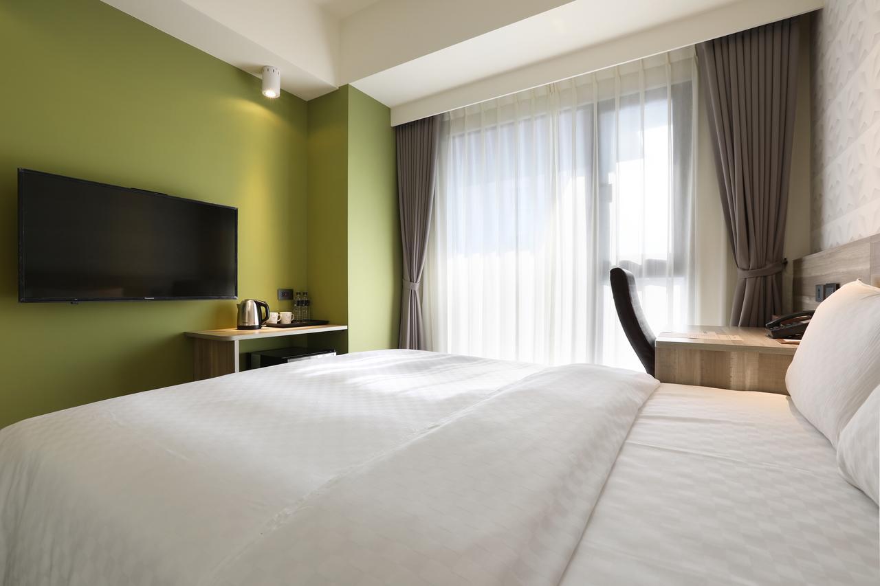 Kun Tour Hotel Тайджун Екстериор снимка