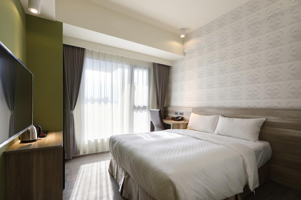 Kun Tour Hotel Тайджун Екстериор снимка