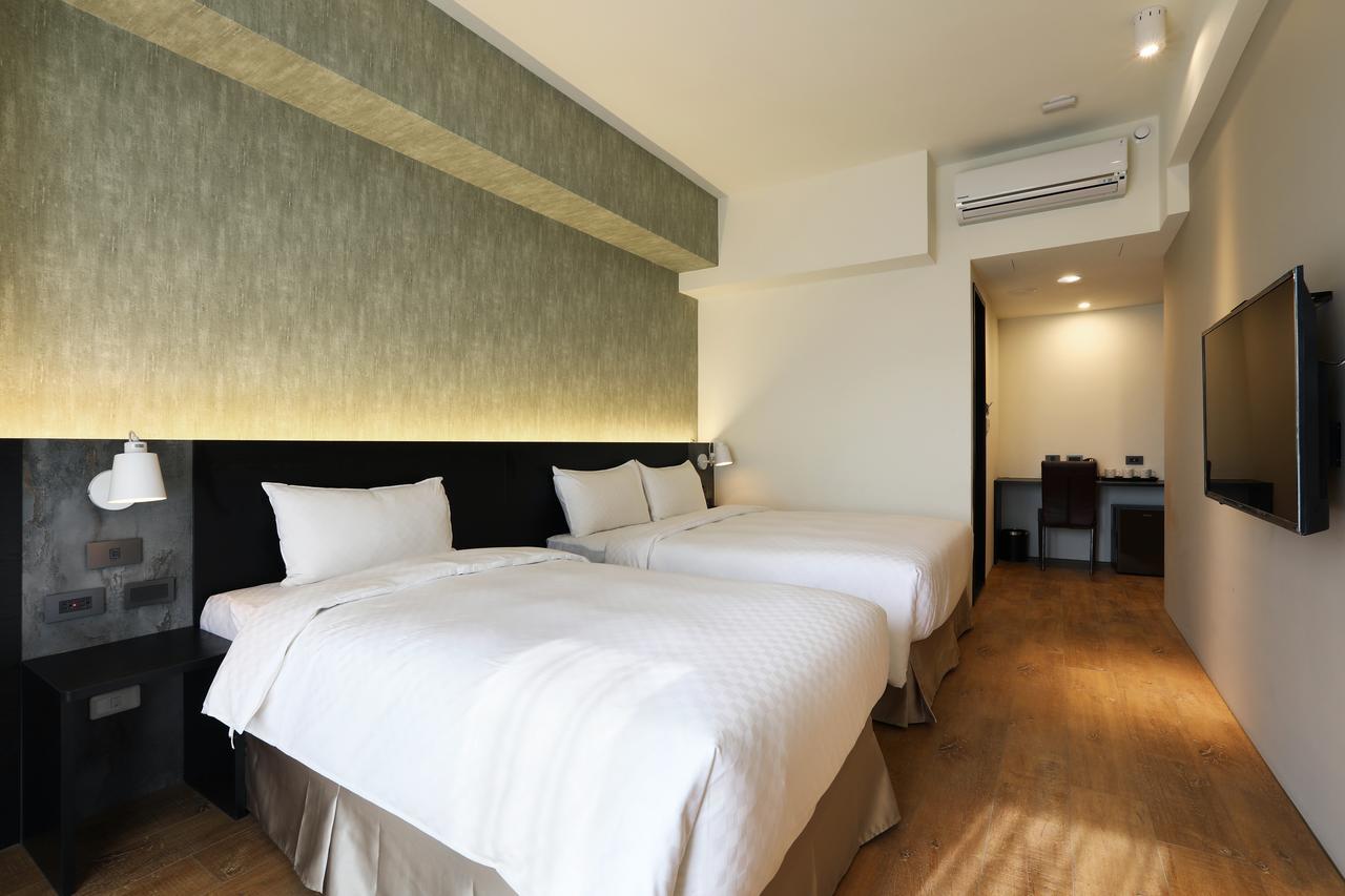 Kun Tour Hotel Тайджун Екстериор снимка