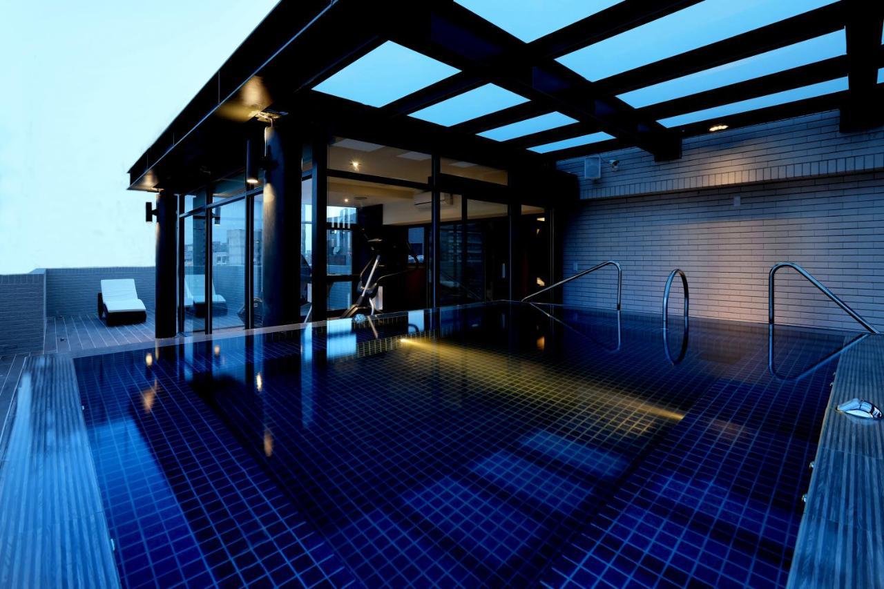 Kun Tour Hotel Тайджун Екстериор снимка