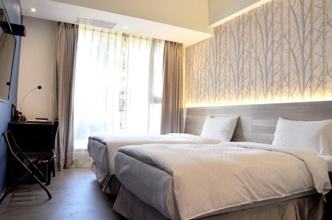 Kun Tour Hotel Тайджун Екстериор снимка